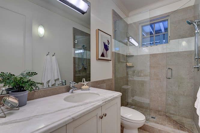 2324 Crest Lane Menlo Park, CA 94025 - Photo 27 of 42 a bathroom with a sink a toilet and shower