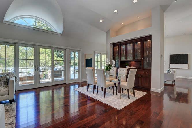2324 Crest Lane Menlo Park, CA 94025 - Photo 8 of 42 a view of a dining room with furniture a chandelier and wooden floor