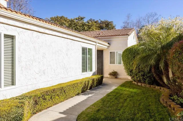 a view of a back yard of the house