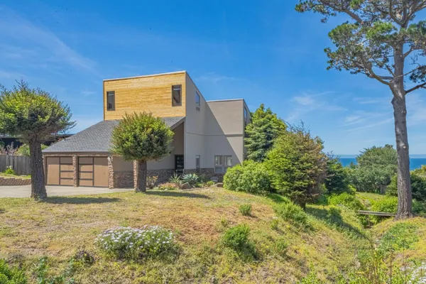 a house view with a outdoor space