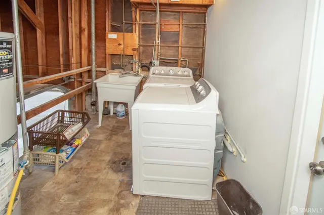 a utility room with dryer and washer