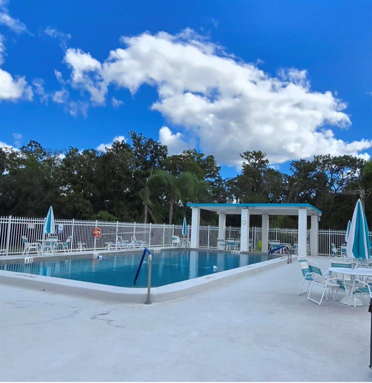 a view of house with outdoor space and entertaining space