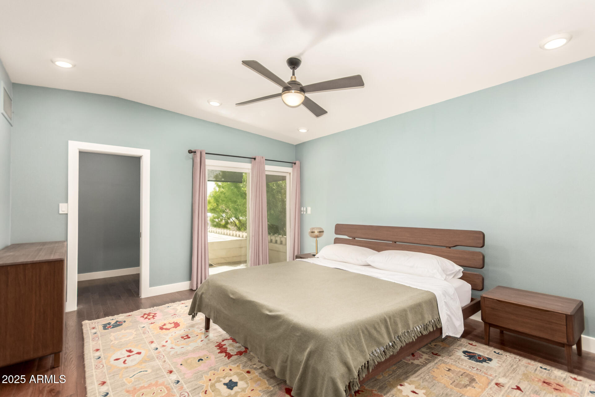 6022 North 10th Way Phoenix, AZ 85014 - Photo 11 of 40 a bedroom with a bed and a window