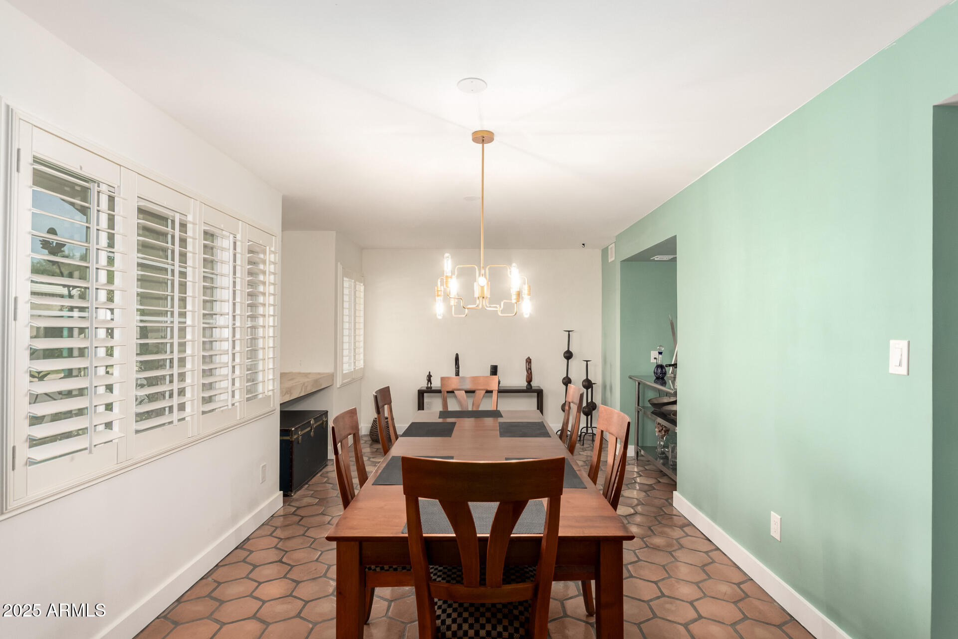 6022 North 10th Way Phoenix, AZ 85014 - Photo 6 of 40 a view of a dining room with furniture and window