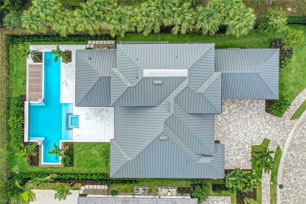 16743 Enclave Circle Naples, FL 34110 - Photo 41 of 42 an aerial view of a house having yard