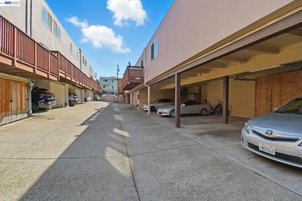 a view of car parked in front of building