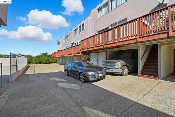 a view of a car park in front of building