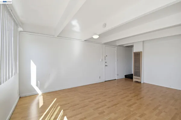 a view of an empty room and window
