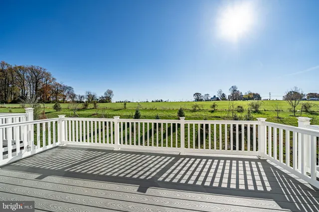 a view of a wooden roof deck