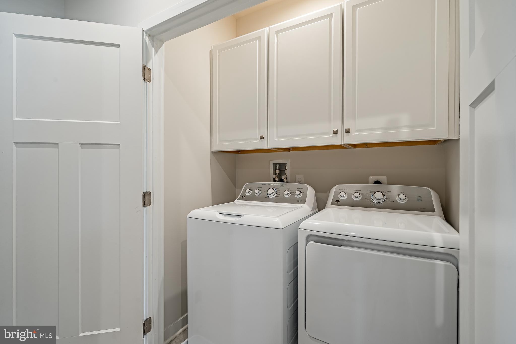 74 Glory Maple Lane Downingtown, PA 19335 - Photo 29 of 32 a view of storage and utility room with washer and dryer