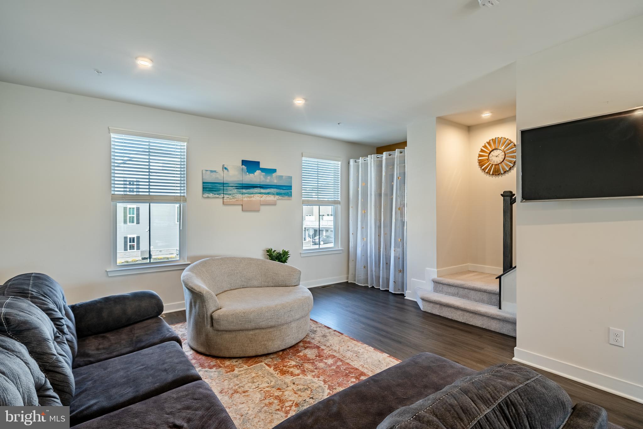 74 Glory Maple Lane Downingtown, PA 19335 - Photo 6 of 32 a living room with furniture and a flat screen tv