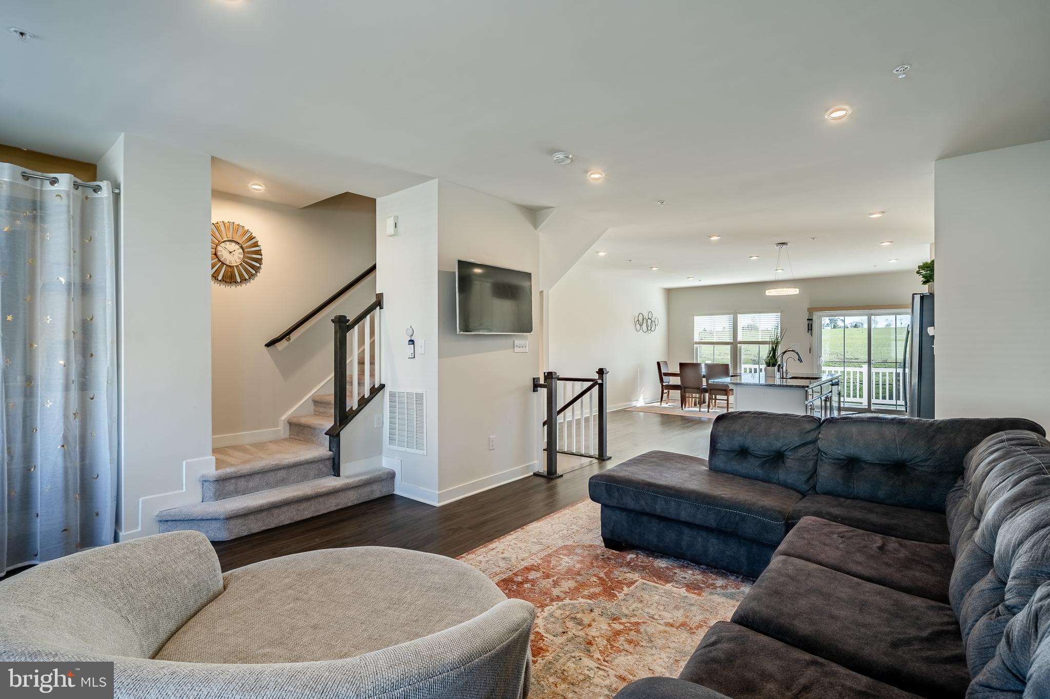 74 Glory Maple Lane Downingtown, PA 19335 - Photo 10 of 32 a living room with furniture and a wooden floor