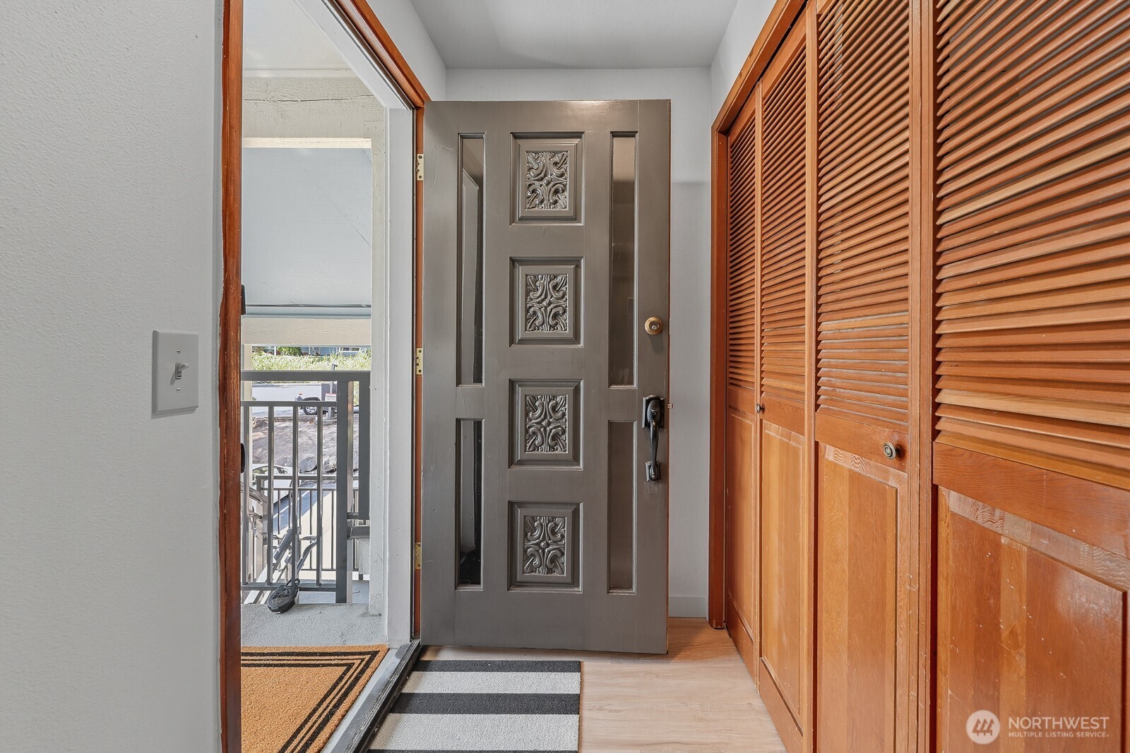 7573 Old Redmond Road, Unit 12 Redmond, WA 98052 - Photo 3 of 24 a view of a hallway with a elevator