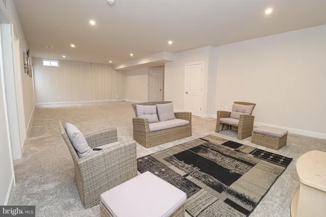 a bathroom with a sink toilet and a mirror