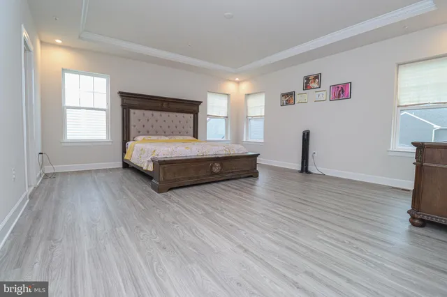 a en suite bathroom with double sink and a mirror
