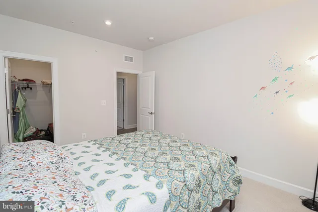 a view of a house with wooden deck