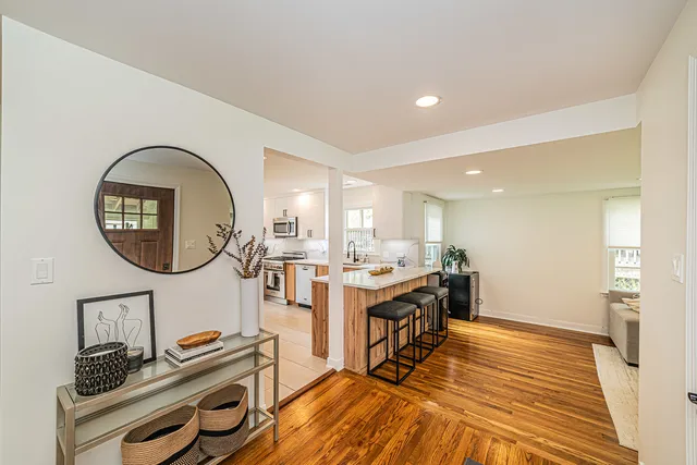 a view of kitchen island with wooden floor