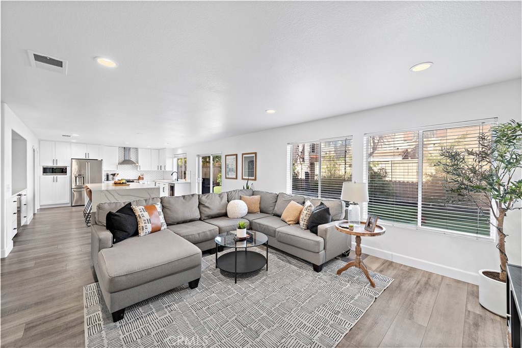 4314 Silver Spring Way Oceanside, CA 92057 - Photo 11 of 49 a living room with furniture and a large window