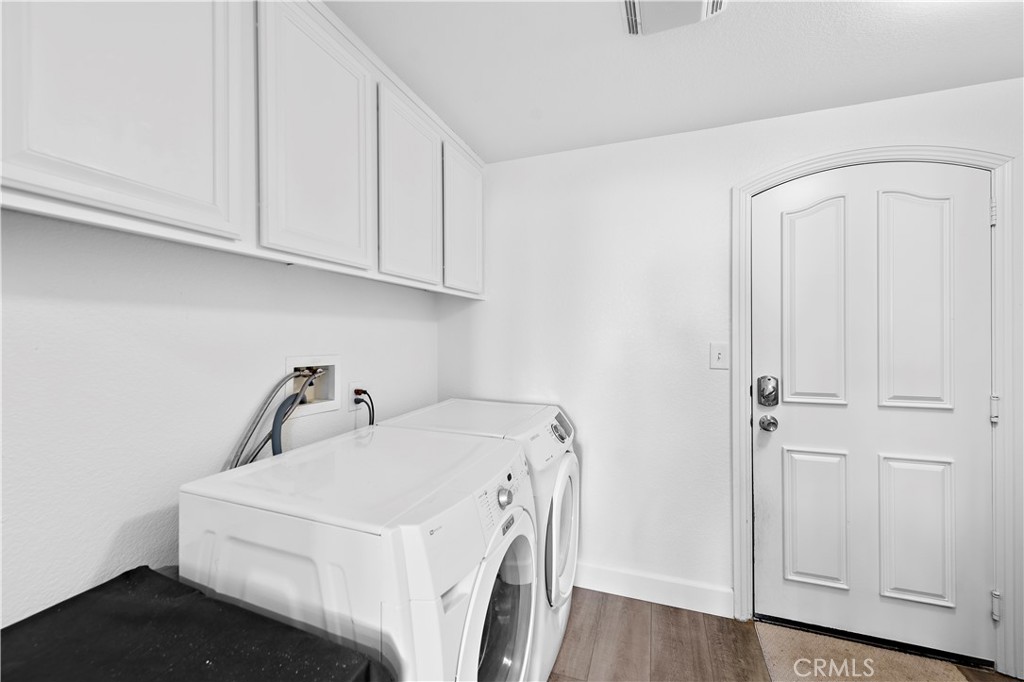 4314 Silver Spring Way Oceanside, CA 92057 - Photo 16 of 49 a utility room with dryer and washer