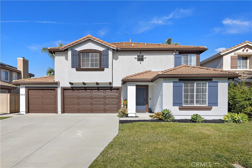 4314 Silver Spring Way Oceanside, CA 92057 - Photo 2 of 49 a front view of a house with garden