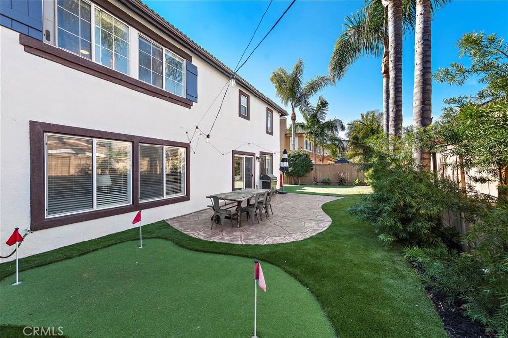 4314 Silver Spring Way Oceanside, CA 92057 - Photo 29 of 49 a view of an house with backyard porch and garden