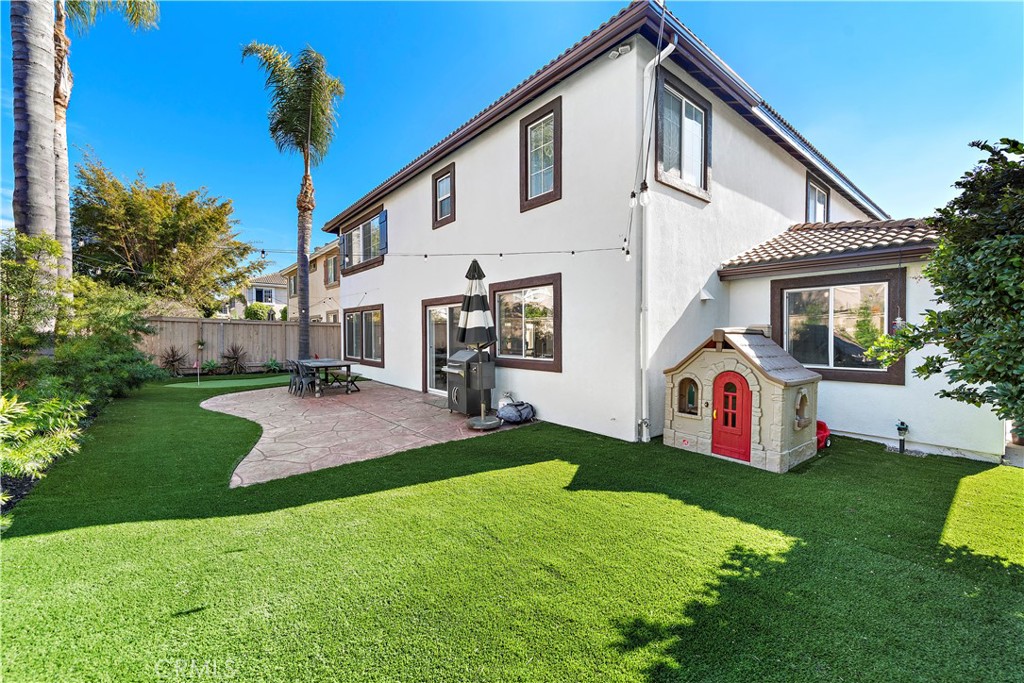 4314 Silver Spring Way Oceanside, CA 92057 - Photo 31 of 49 a front view of house with yard and green space