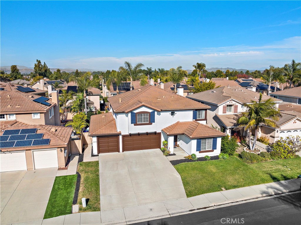 4314 Silver Spring Way Oceanside, CA 92057 - Photo 36 of 49 a view of a city with a building in the background