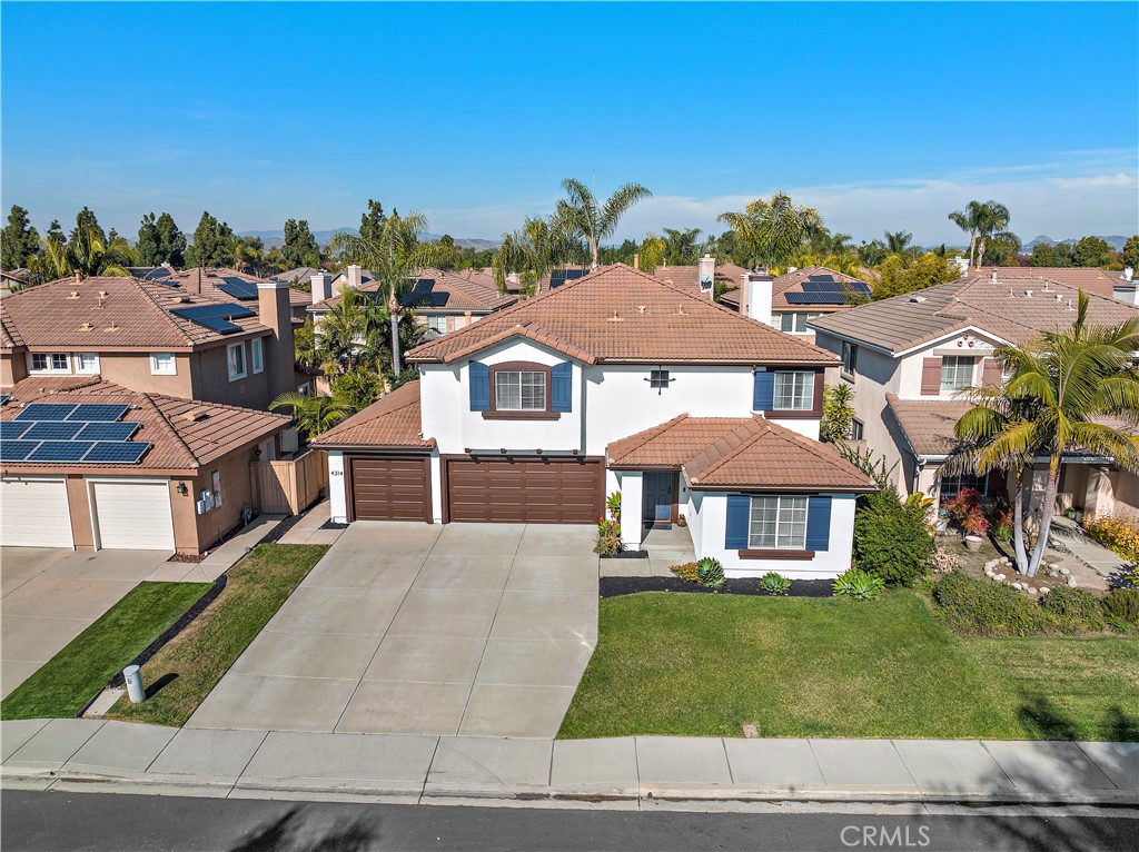 4314 Silver Spring Way Oceanside, CA 92057 - Photo 37 of 49 an aerial view of a residential apartment building with a yard