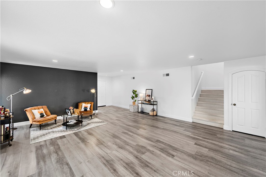 4314 Silver Spring Way Oceanside, CA 92057 - Photo 9 of 49 a living room with furniture and a wooden floor