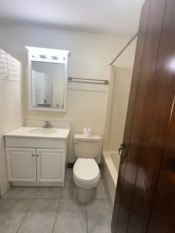 a kitchen with a stove and a sink