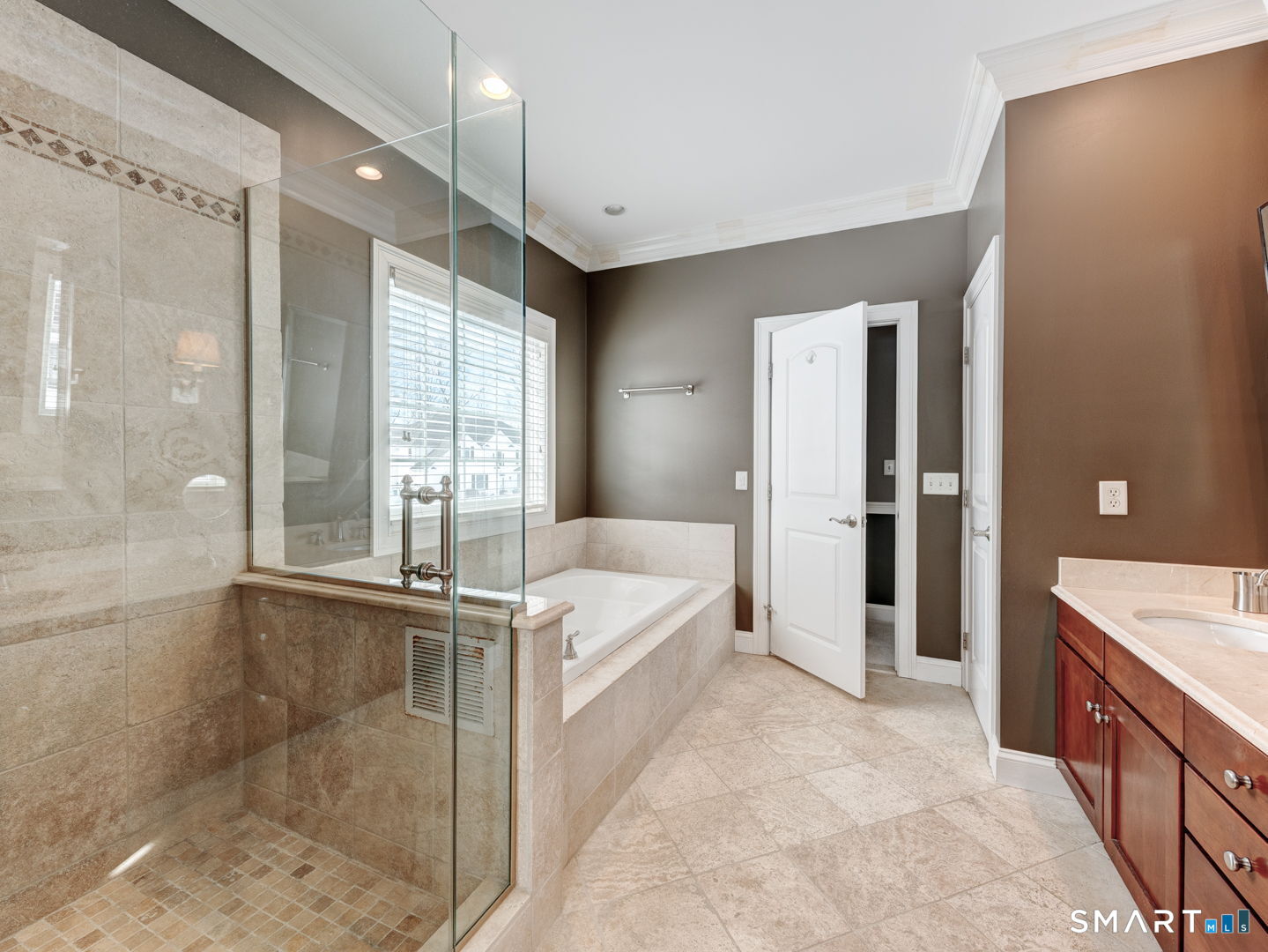 254 Sunset Ridge Rocky Hill, CT 06067 - Photo 15 of 40 a spacious bathroom with a large tub shower and sink