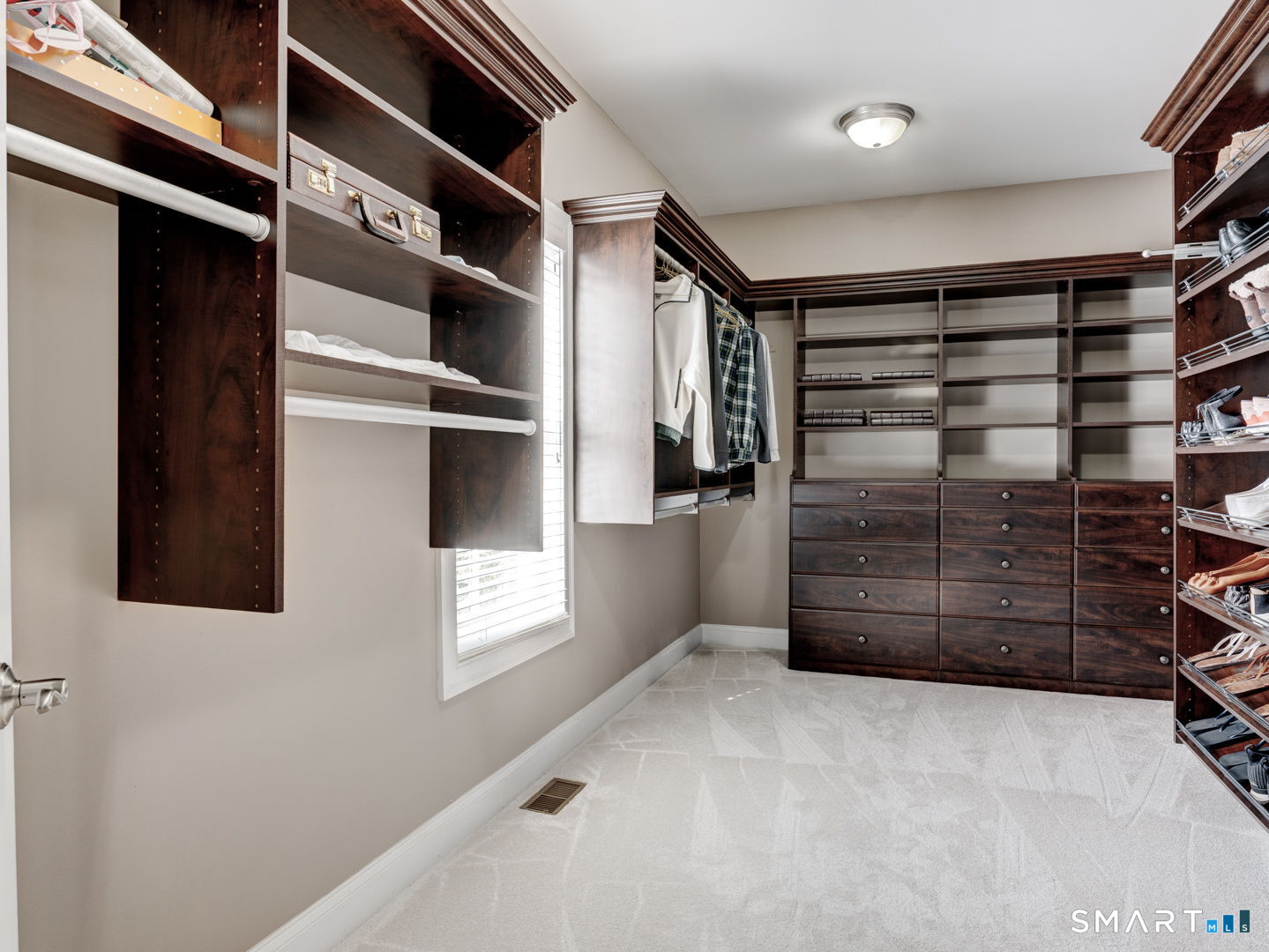 254 Sunset Ridge Rocky Hill, CT 06067 - Photo 16 of 40 a view of walk in closet with clothes