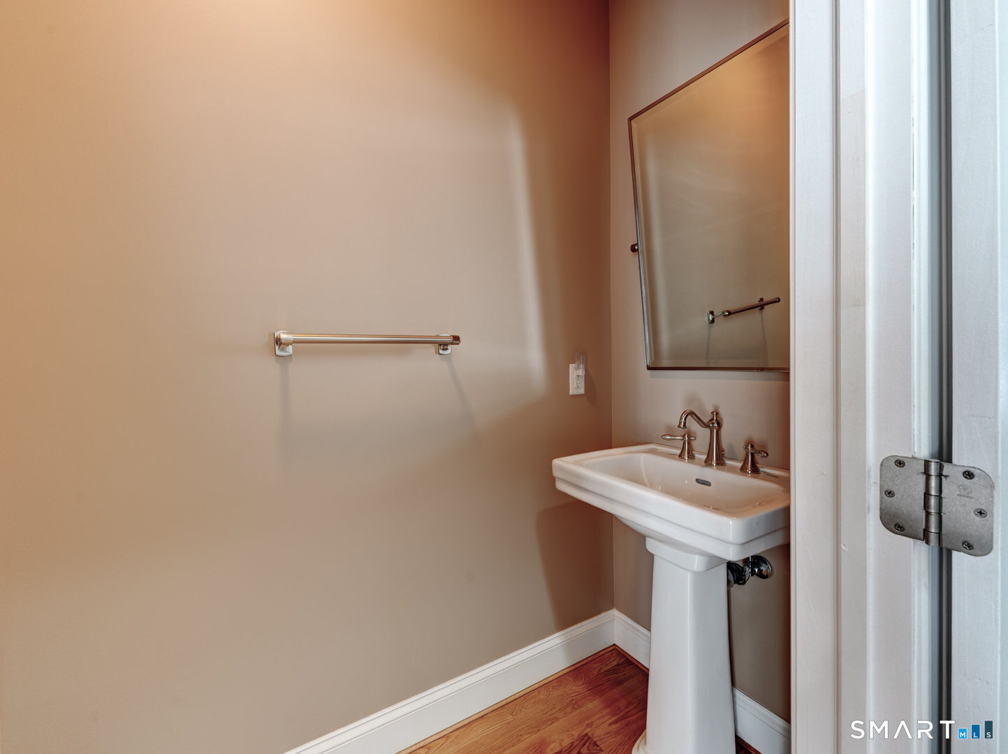 254 Sunset Ridge Rocky Hill, CT 06067 - Photo 19 of 40 a bathroom with a sink and a mirror