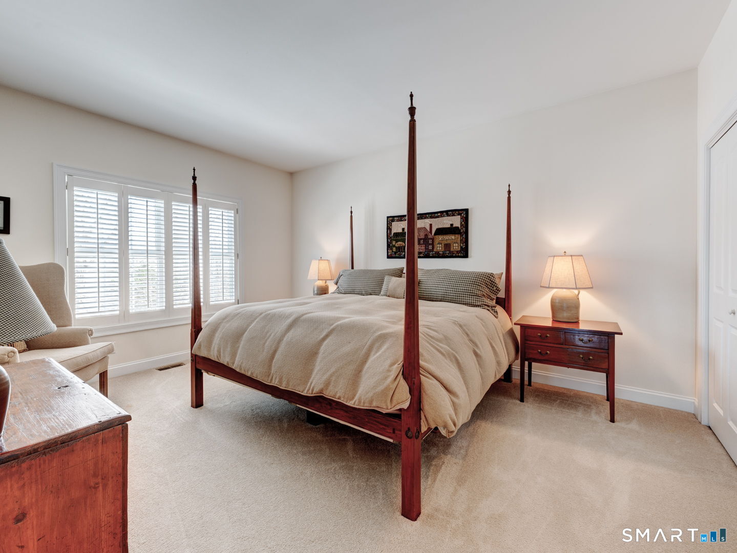 254 Sunset Ridge Rocky Hill, CT 06067 - Photo 26 of 40 a bedroom with a bed lamp and window