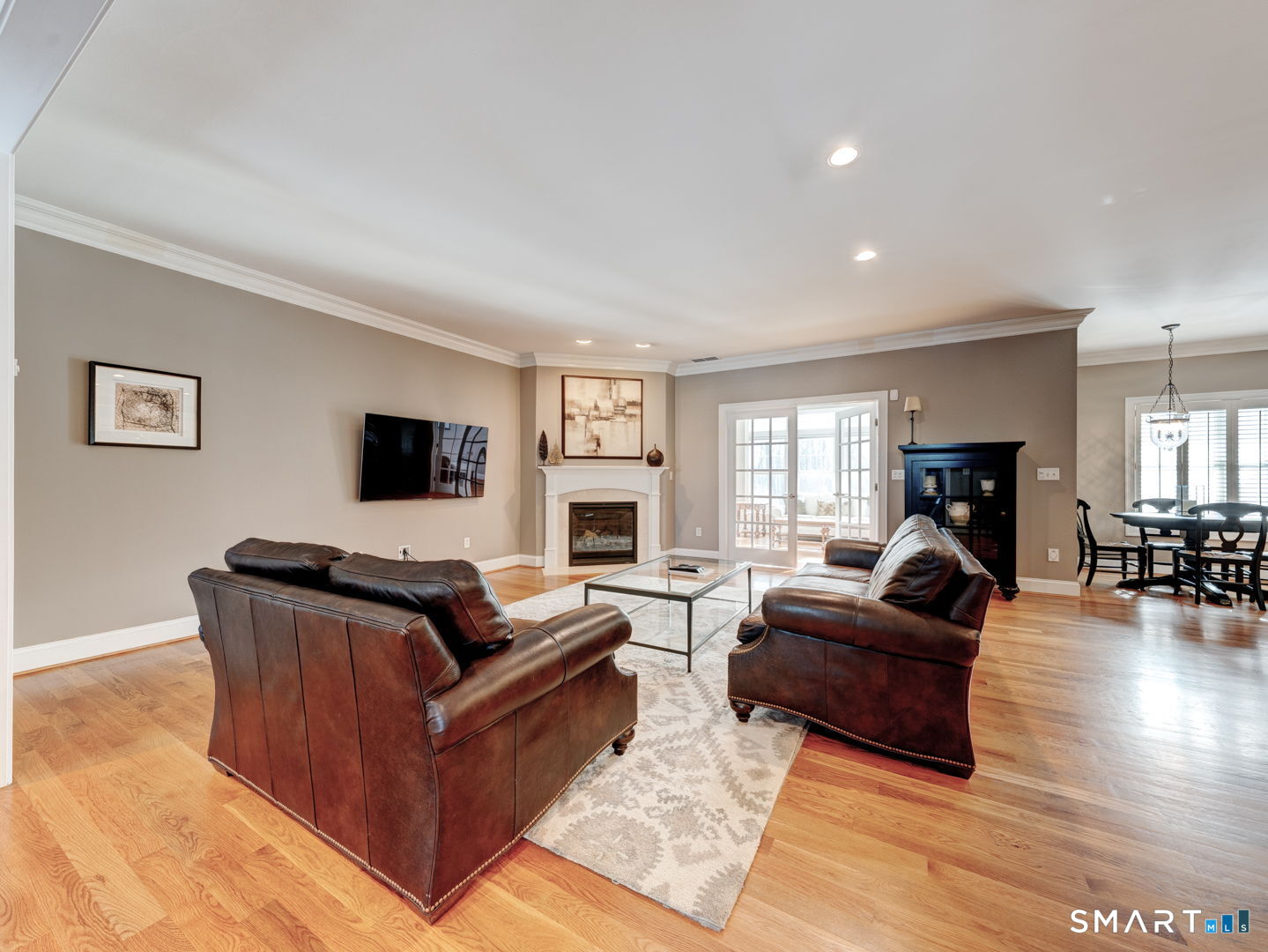 254 Sunset Ridge Rocky Hill, CT 06067 - Photo 5 of 40 a living room with furniture and a flat screen tv