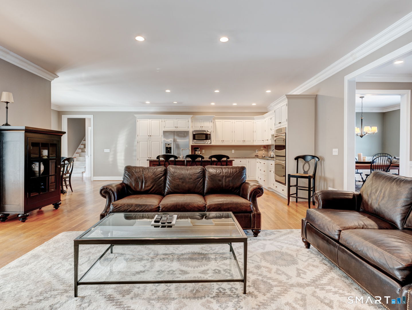 254 Sunset Ridge Rocky Hill, CT 06067 - Photo 6 of 40 a living room with furniture and a view of kitchen