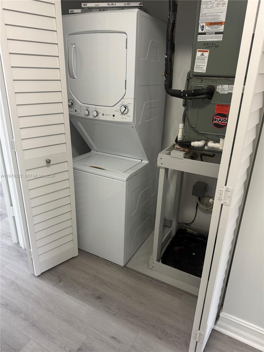 14909 Southwest 80th Street, Unit 216 Miami, FL 33193 - Photo 13 of 16 a utility room with dryer and washer
