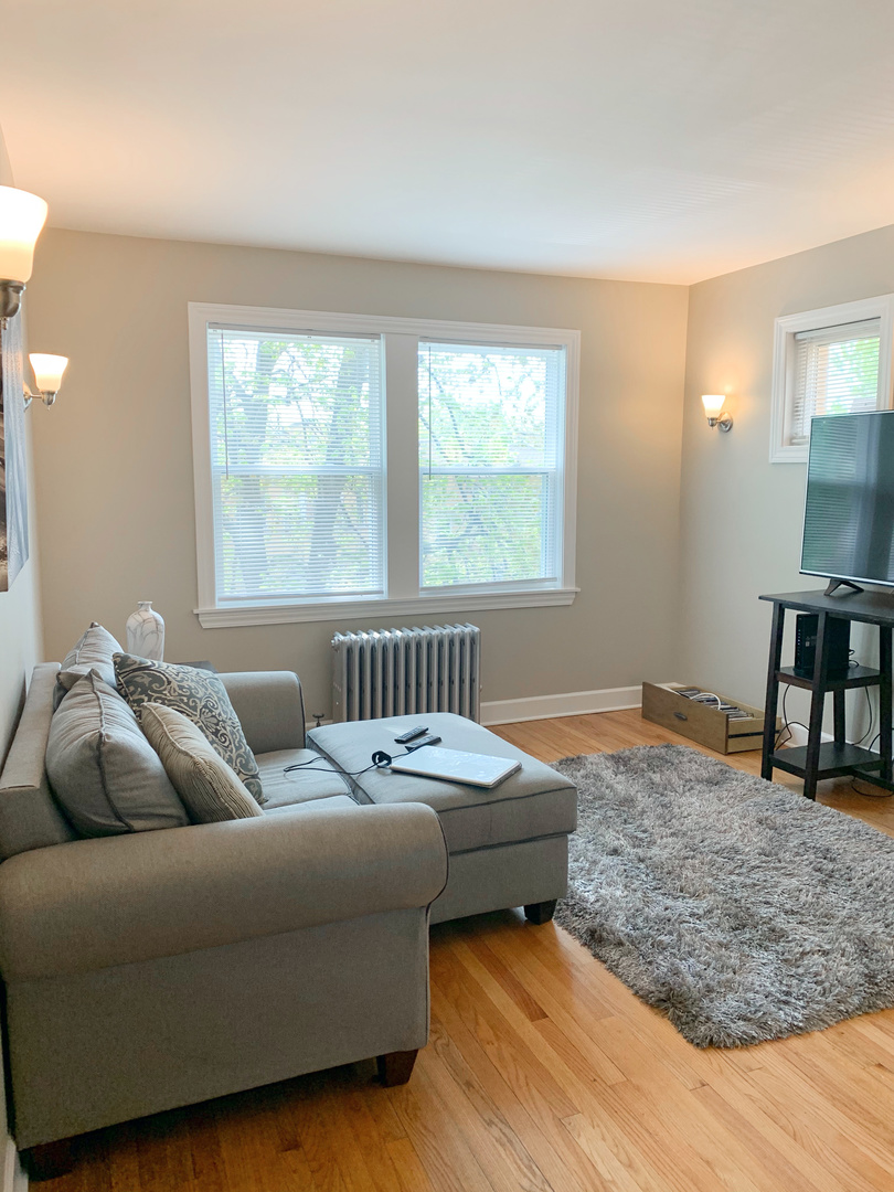 1921 Grove Avenue, Unit 37 Berwyn, IL 60402 - Photo 2 of 18 a living room with furniture and a window