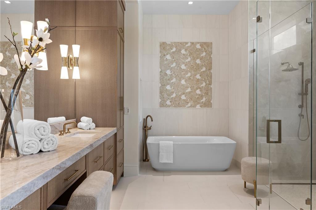 850 10th Street North Naples, FL 34102 - Photo 19 of 50 Custom cabinetry and Visual Comfort sconces