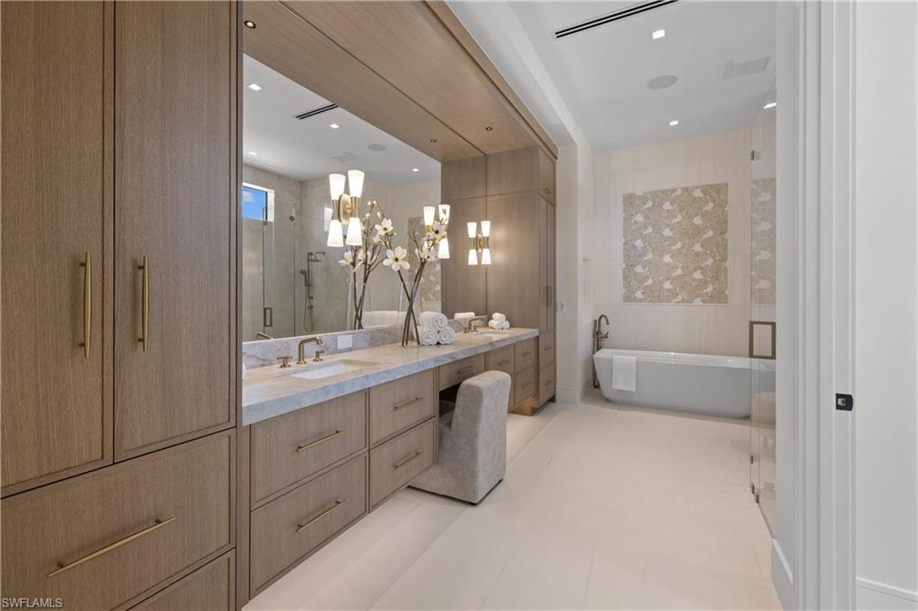850 10th Street North Naples, FL 34102 - Photo 20 of 50 Opulent spa-like primary bathroom