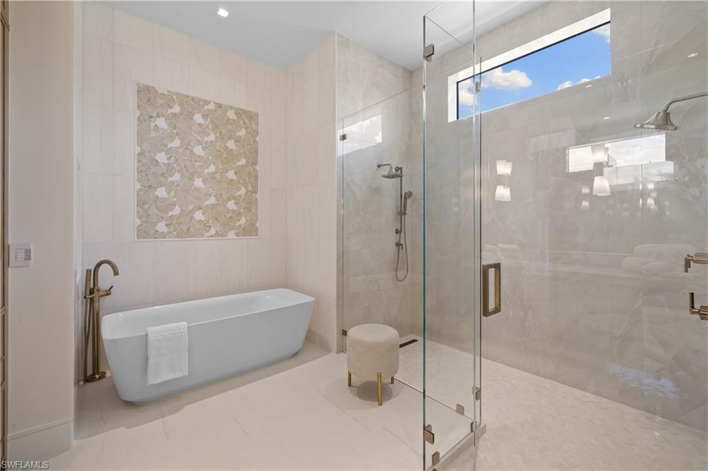 850 10th Street North Naples, FL 34102 - Photo 21 of 50 Walden Bianco Onyx Mosaic, Onyx Ivory Lappato, Bianco Dolomite tile