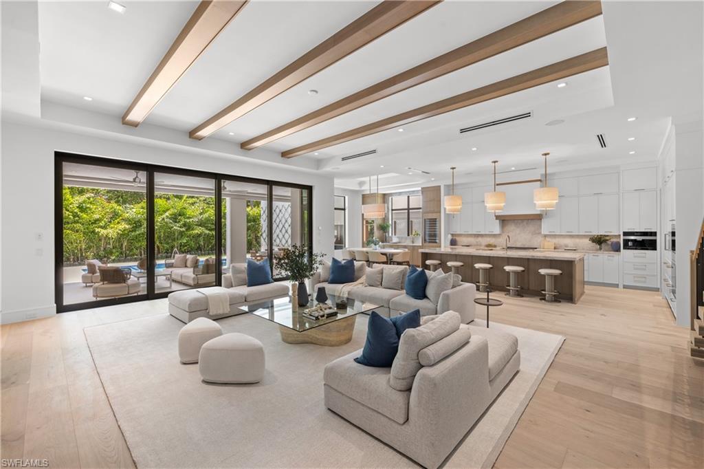 850 10th Street North Naples, FL 34102 - Photo 3 of 50 An abundance of natural light that fills the space with warmth and radiance