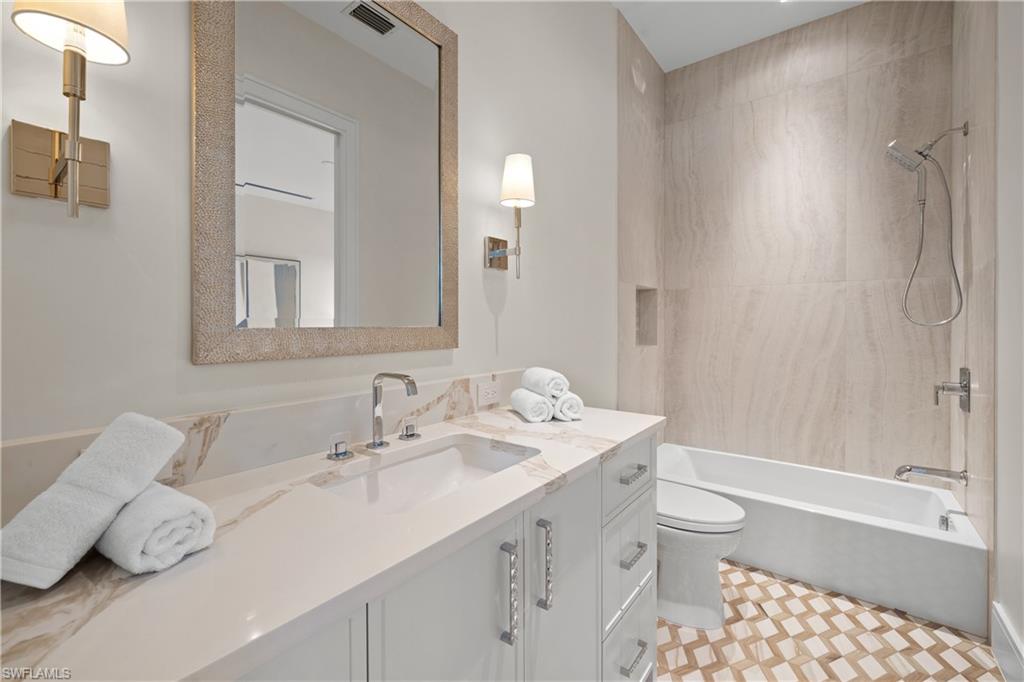 850 10th Street North Naples, FL 34102 - Photo 38 of 50 5th en-suite bathroom