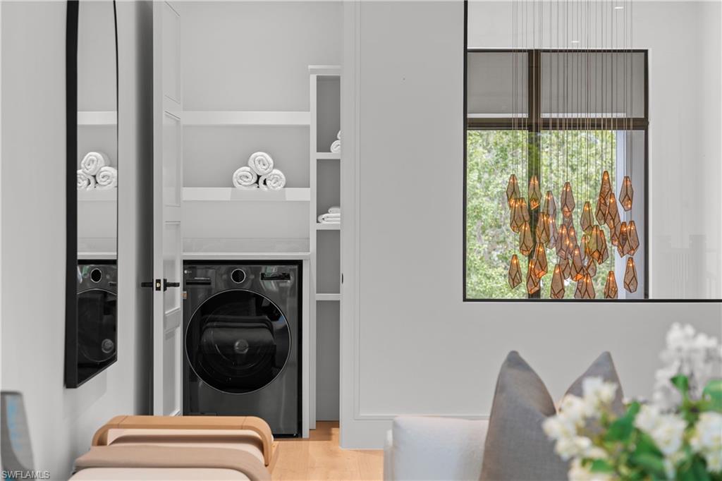 850 10th Street North Naples, FL 34102 - Photo 40 of 50 2nd level laundry with LG Smart WashCombo™ All-in-One Washer/Drye