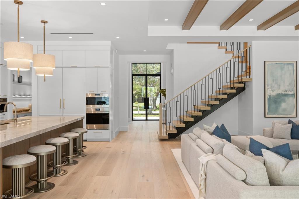 850 10th Street North Naples, FL 34102 - Photo 9 of 50 White oak flooring throughout