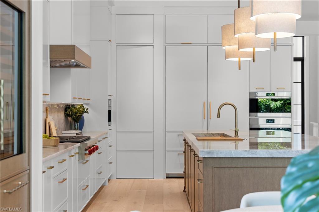 850 10th Street North Naples, FL 34102 - Photo 10 of 50 Hidden pantry