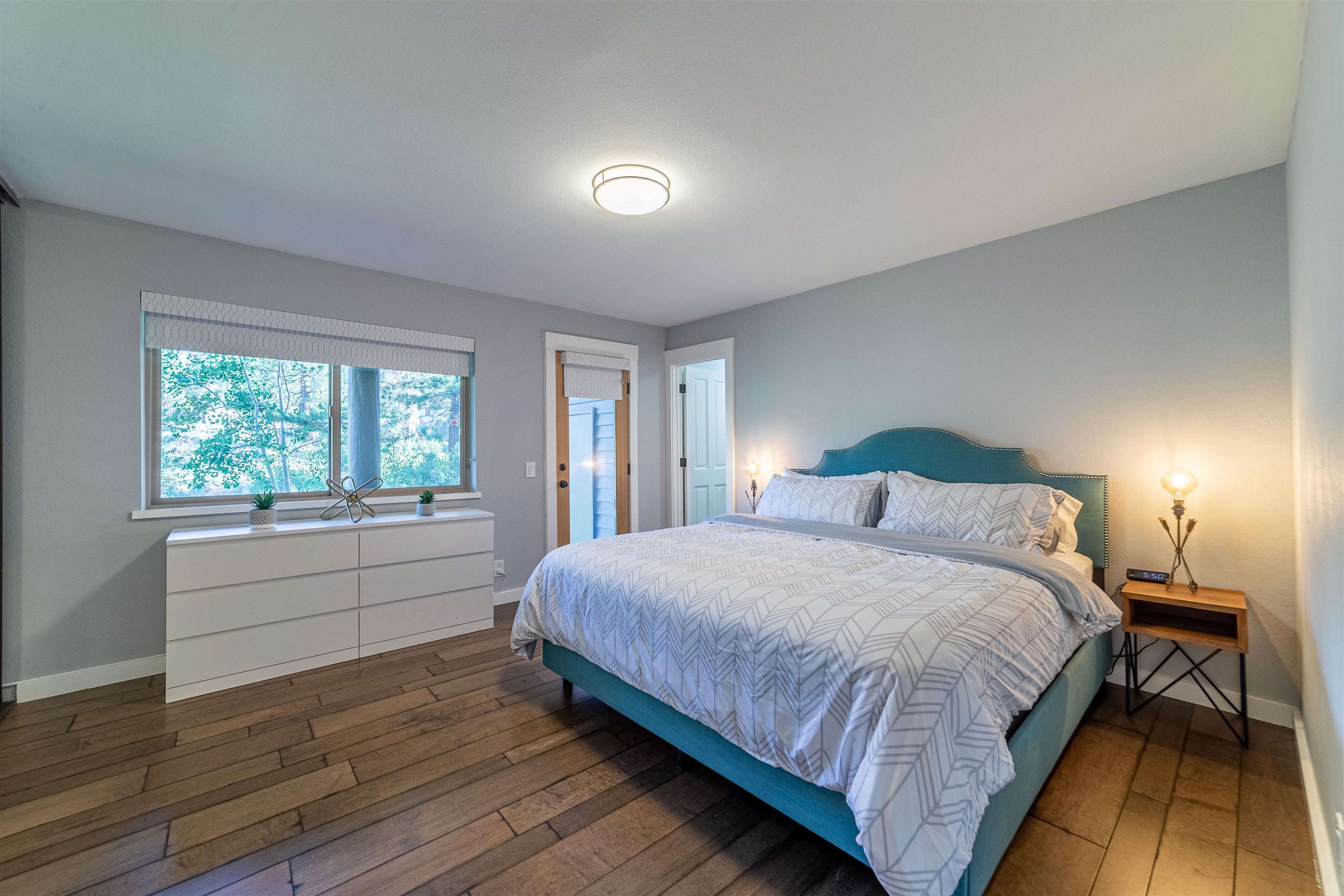 384 Joaquin Road, Unit 31 Mammoth Lakes, CA 93546 - Photo 13 of 29 Bedroom featuring hardwood / wood-style floors and baseboards