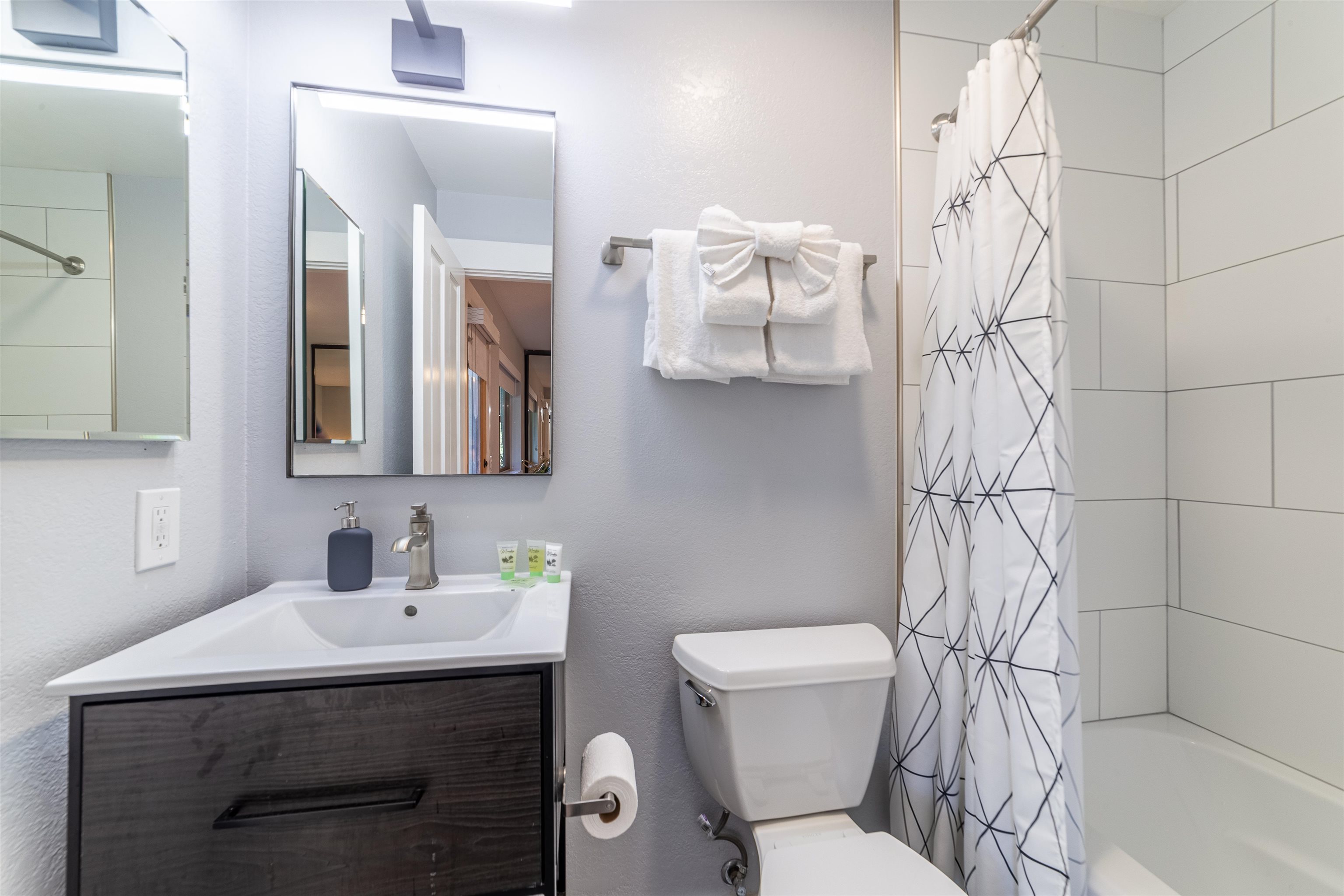 384 Joaquin Road, Unit 31 Mammoth Lakes, CA 93546 - Photo 16 of 29 Bathroom with shower / bath combo with shower curtain and vanity