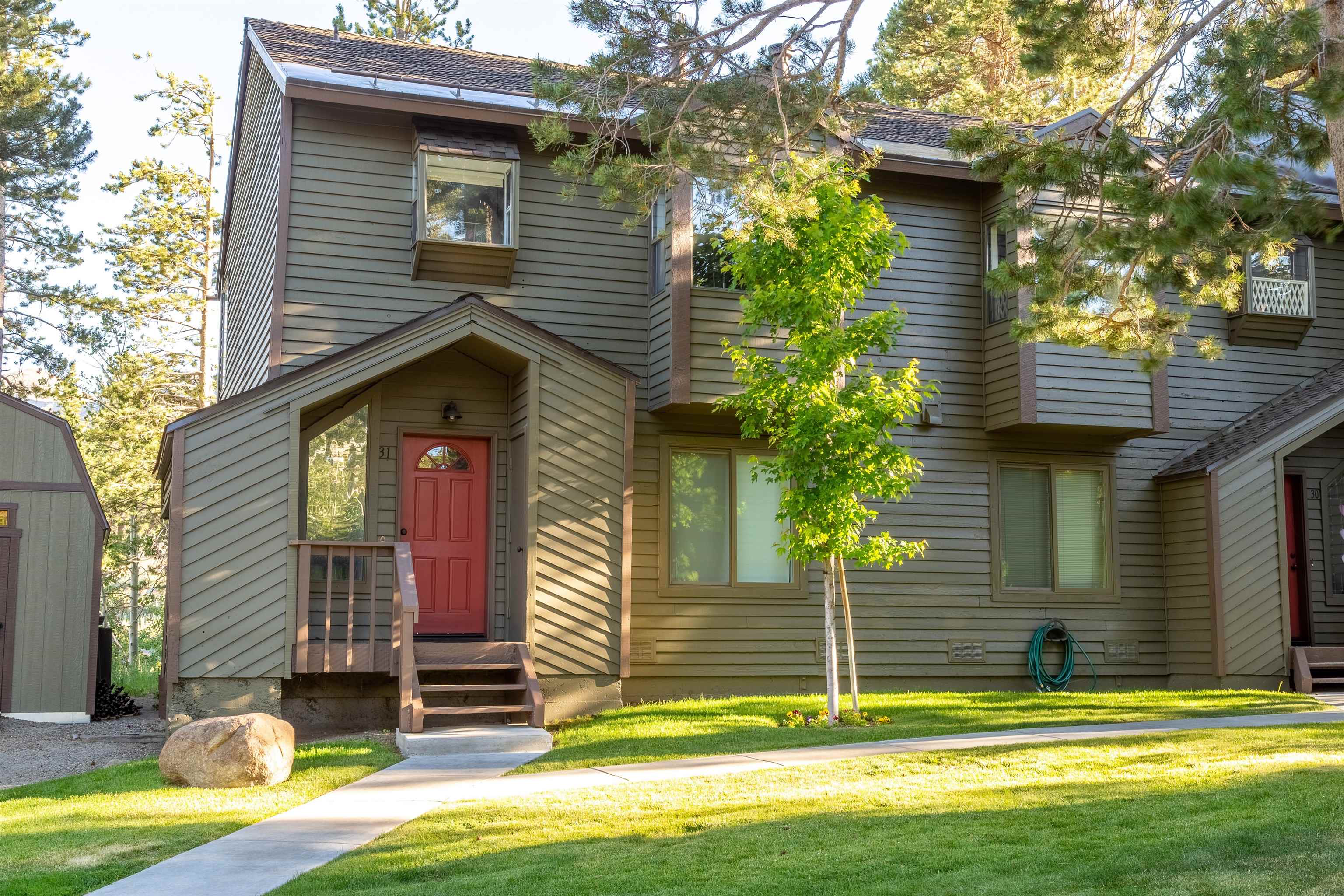 384 Joaquin Road, Unit 31 Mammoth Lakes, CA 93546 - Photo 23 of 29 View of front facade featuring a front yard