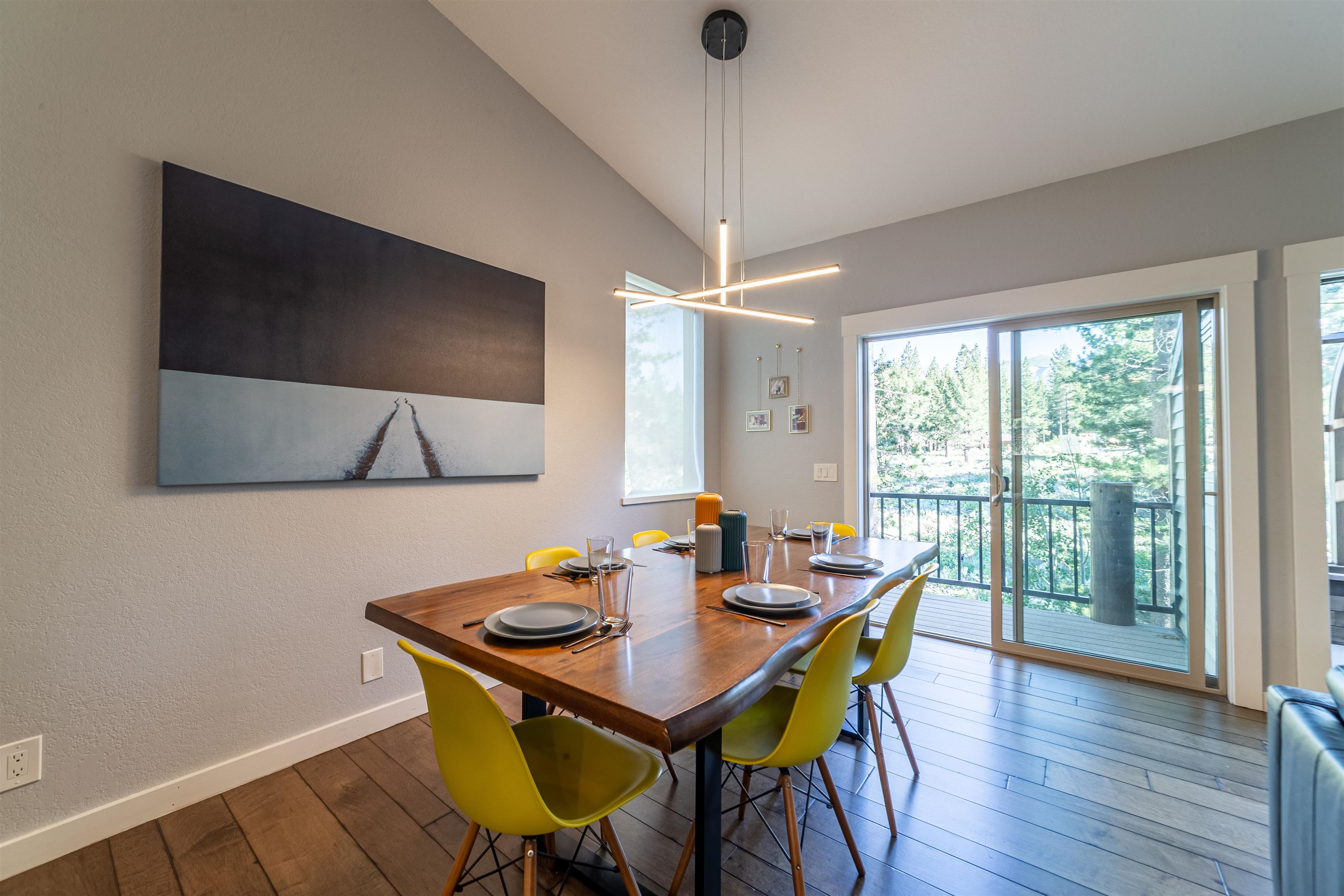 384 Joaquin Road, Unit 31 Mammoth Lakes, CA 93546 - Photo 6 of 29 Dining area with hardwood / wood-style floors and vaulted ceiling